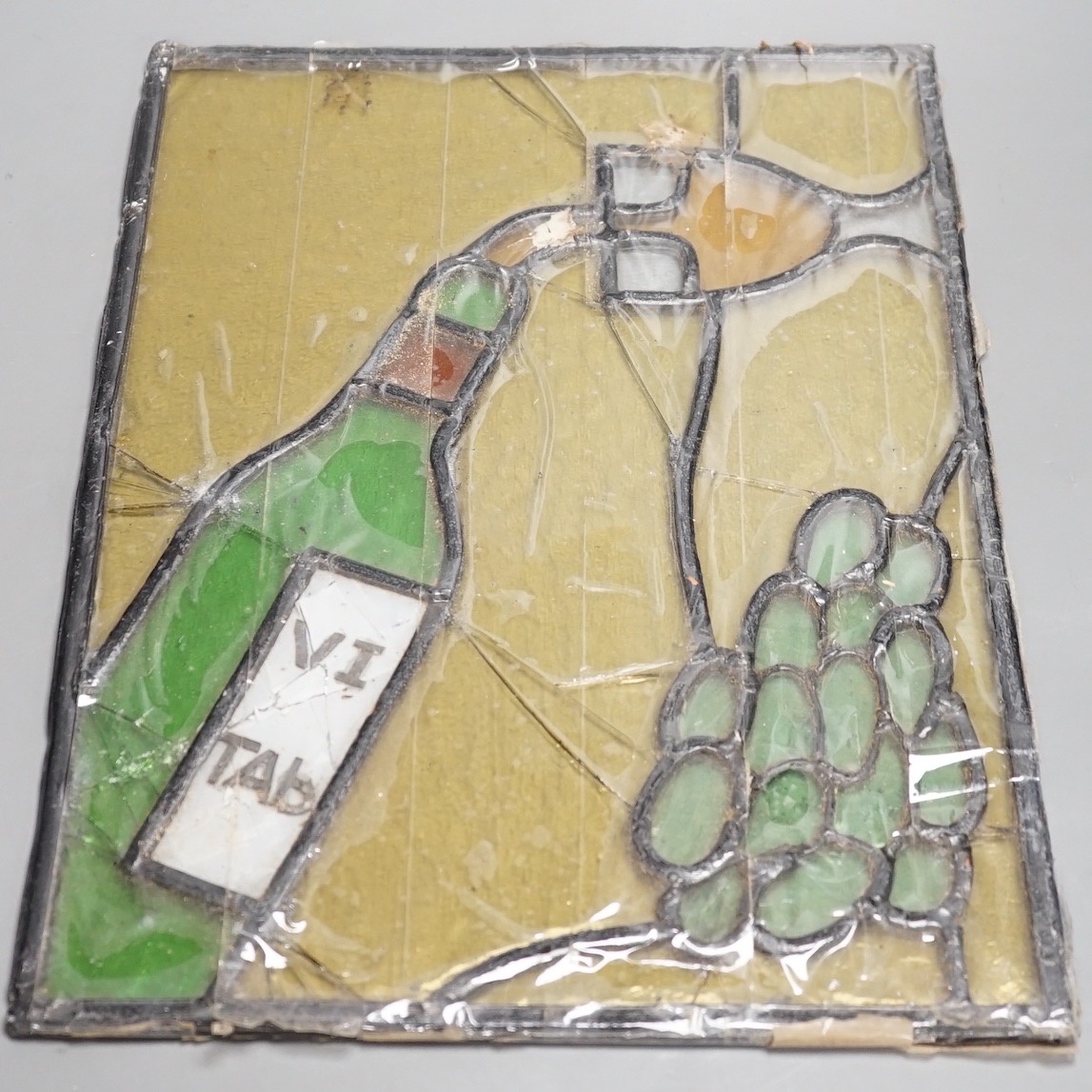 A wine related stained glass panel, 28cms wide x 38cms high